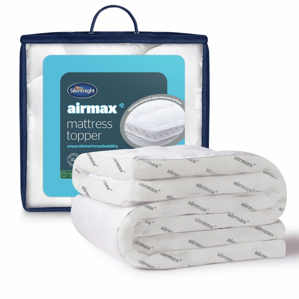 Silentnight Airmax 5cm mattress topper rolled beside its packaging