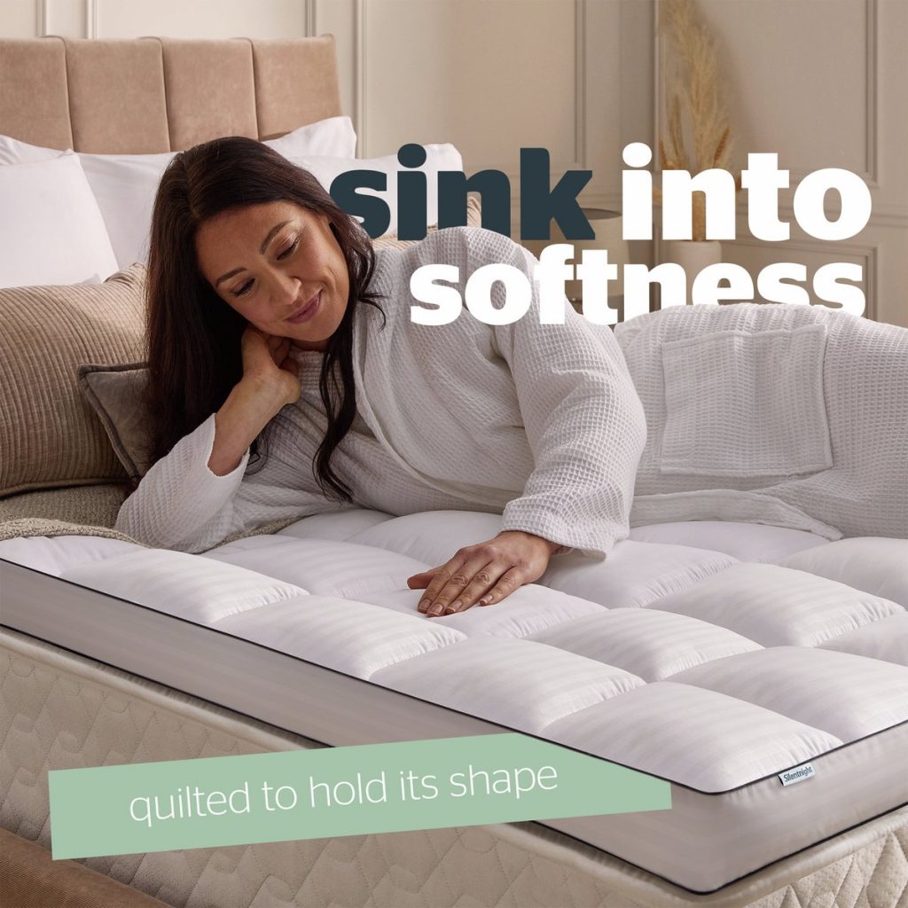Woman lying on the Silentnight Hotel Collection 10cm topper