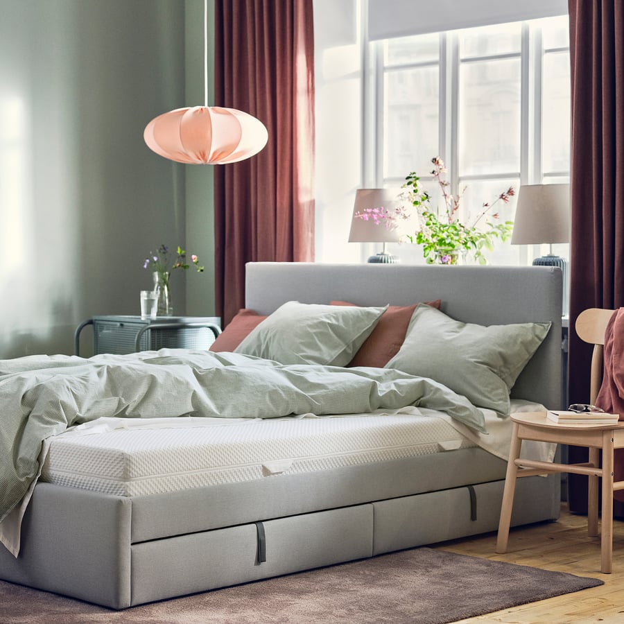 IKEA Åbygda mattress on a bed in a modern bedroom