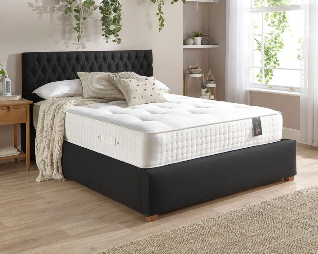 Aspire 3000 Pocket Wool Cashmere and Silk mattress on a black bed