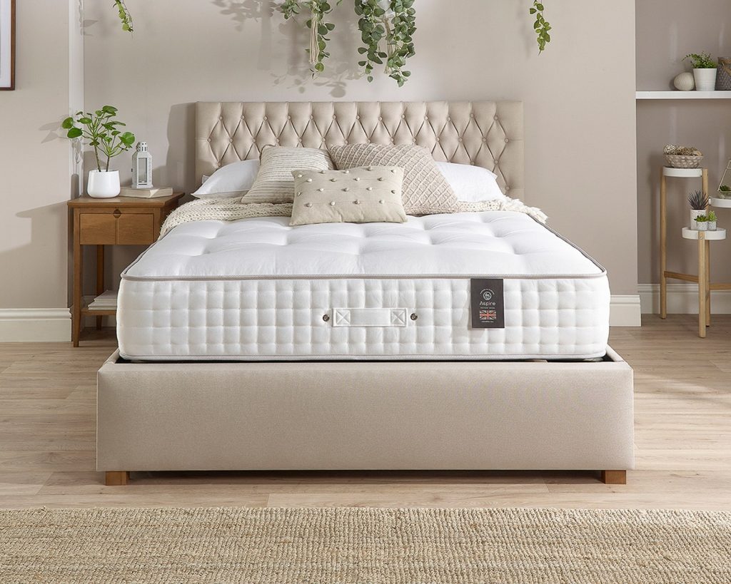 Aspire 7000 Pocket Wool Cashmere and Silk mattress on a beige bed