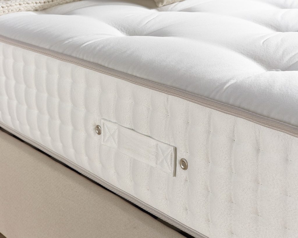 Tufted top and deep stitched border of the Aspire 7000 mattress