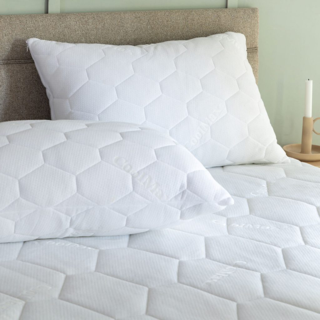 Coolmax logo woven into the quilted top of the Soak&Sleep mattress protector