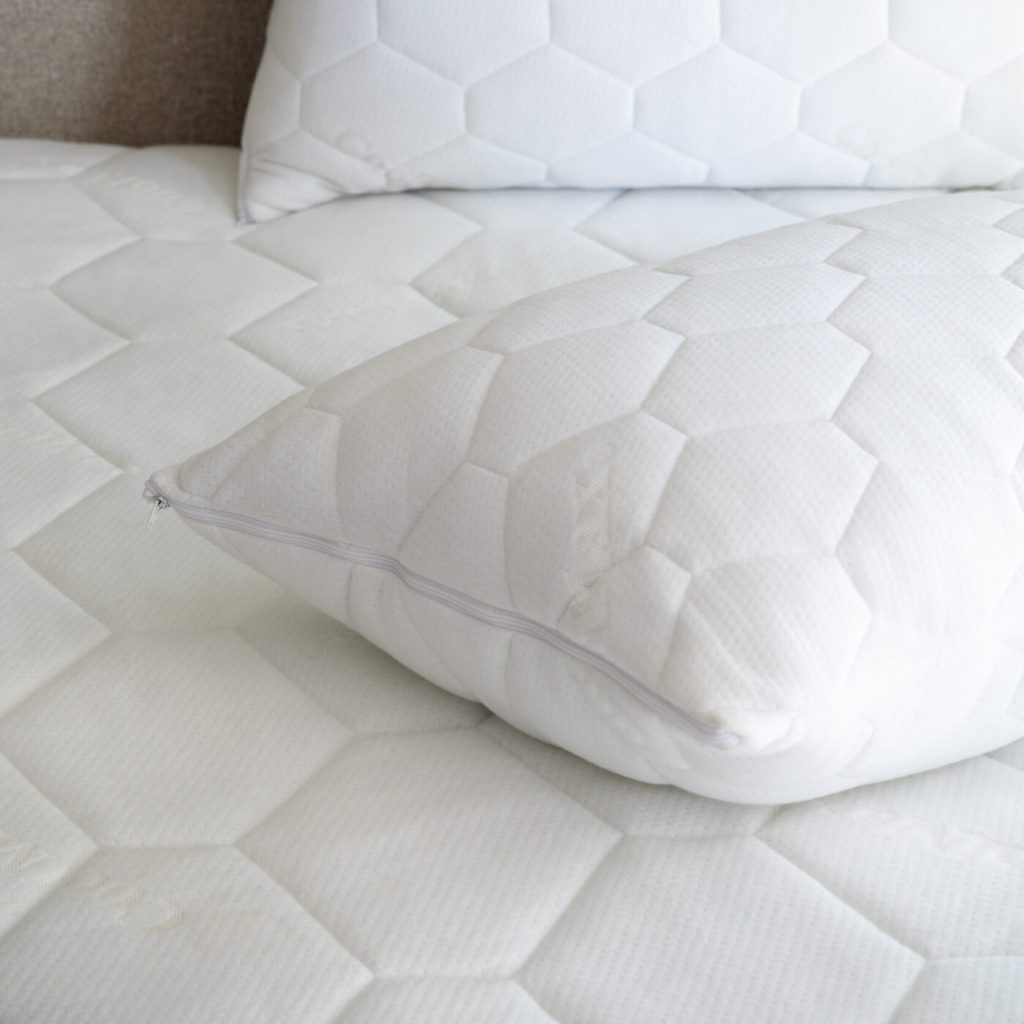 Zipped Coolmax pillow protector resting on the Soak&Sleep Coolmax mattress protector