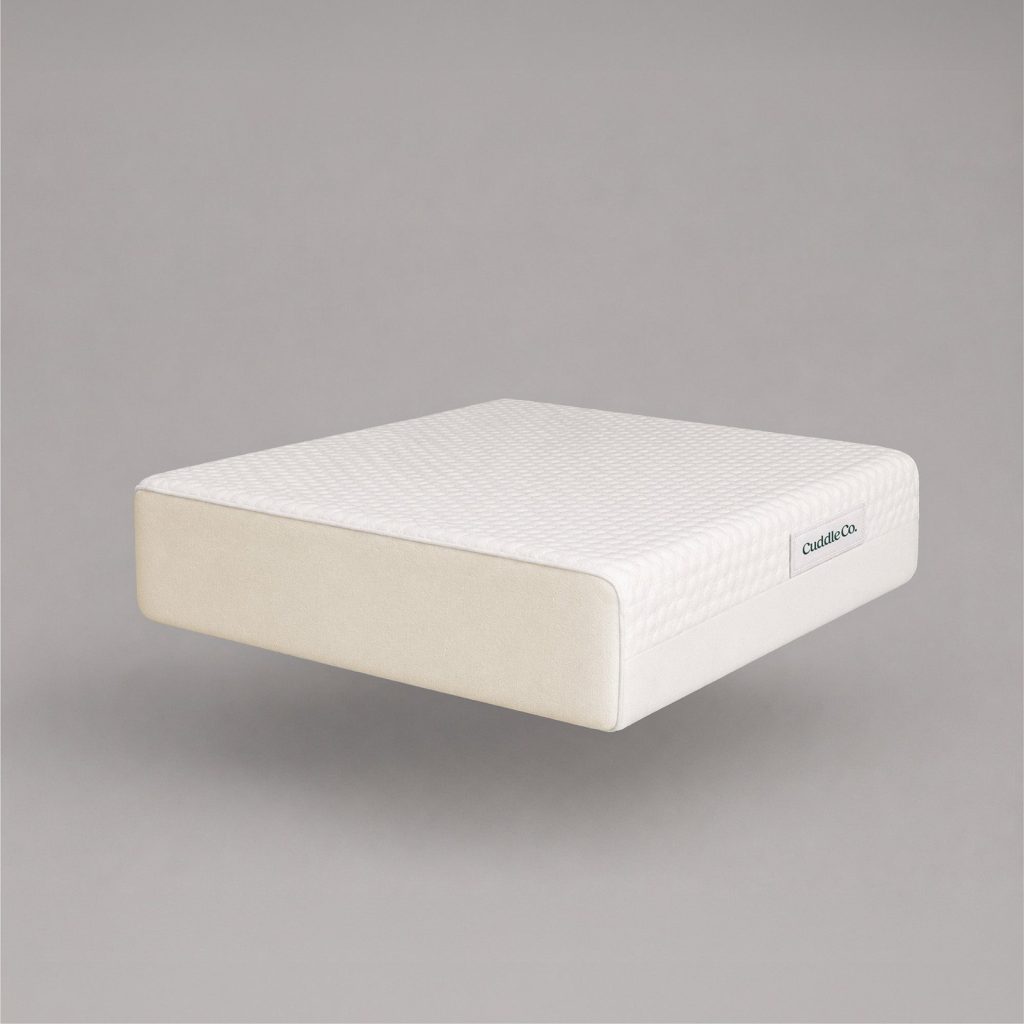 CuddleCo Lullaby Bamboo Foam Cot Mattress end view showing the foam edge