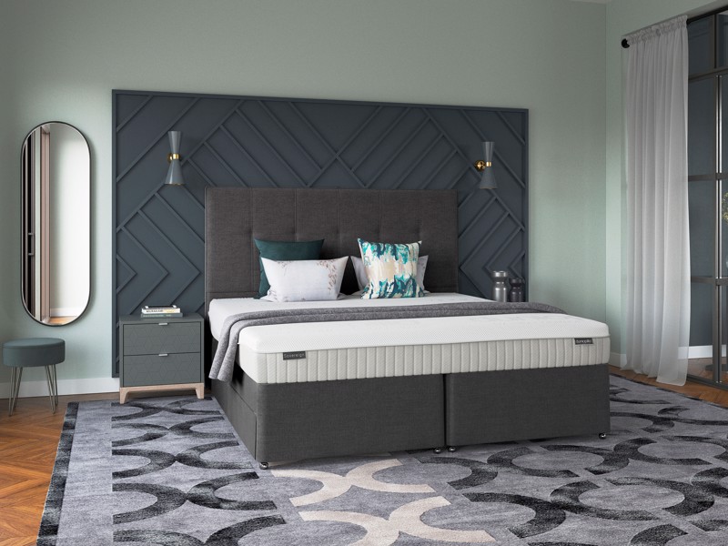 Dunlopillo Sovereign mattress on a grey divan bed in a green bedroom