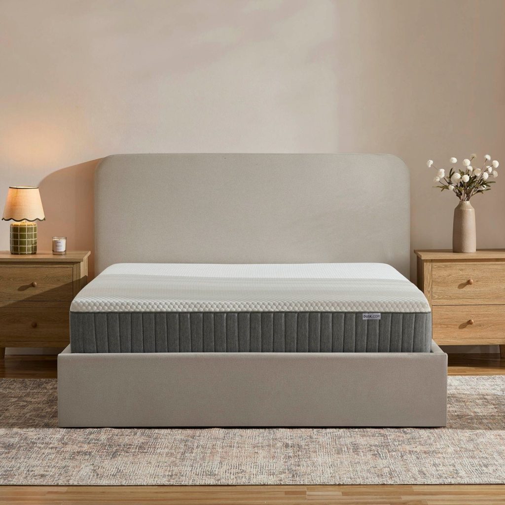 DUSK Foam 1000 mattress on an upholstered bed frame in a bedroom