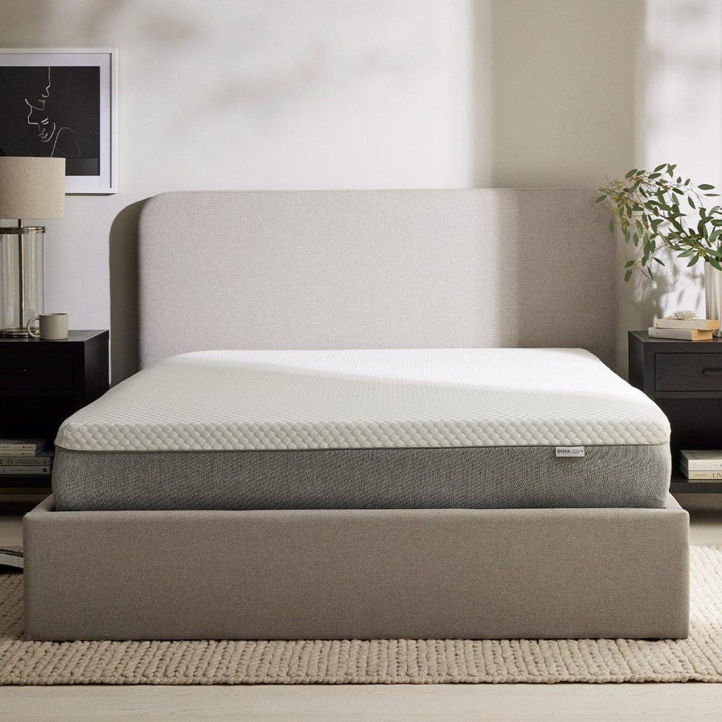 DUSK Memory Foam 2000 hybrid mattress on an upholstered bed