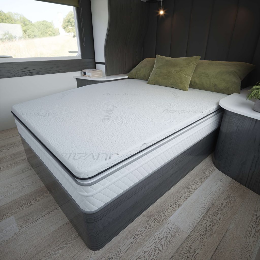 Duvalay custom topper on a caravan island bed