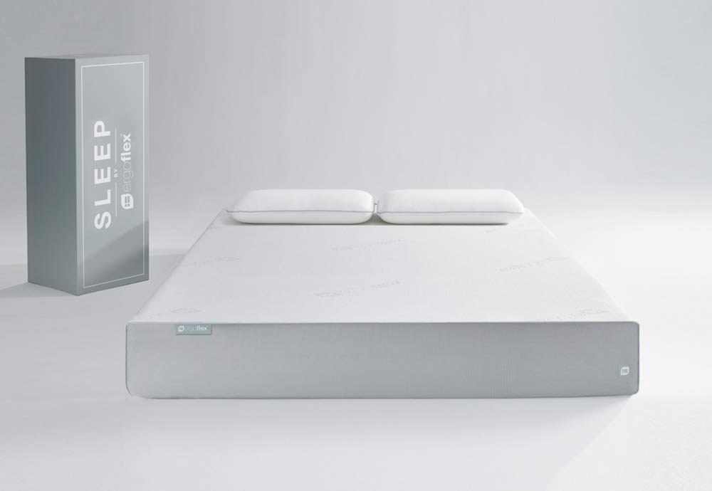 Ergoflex 5G mattress with two pillows next to its delivery box