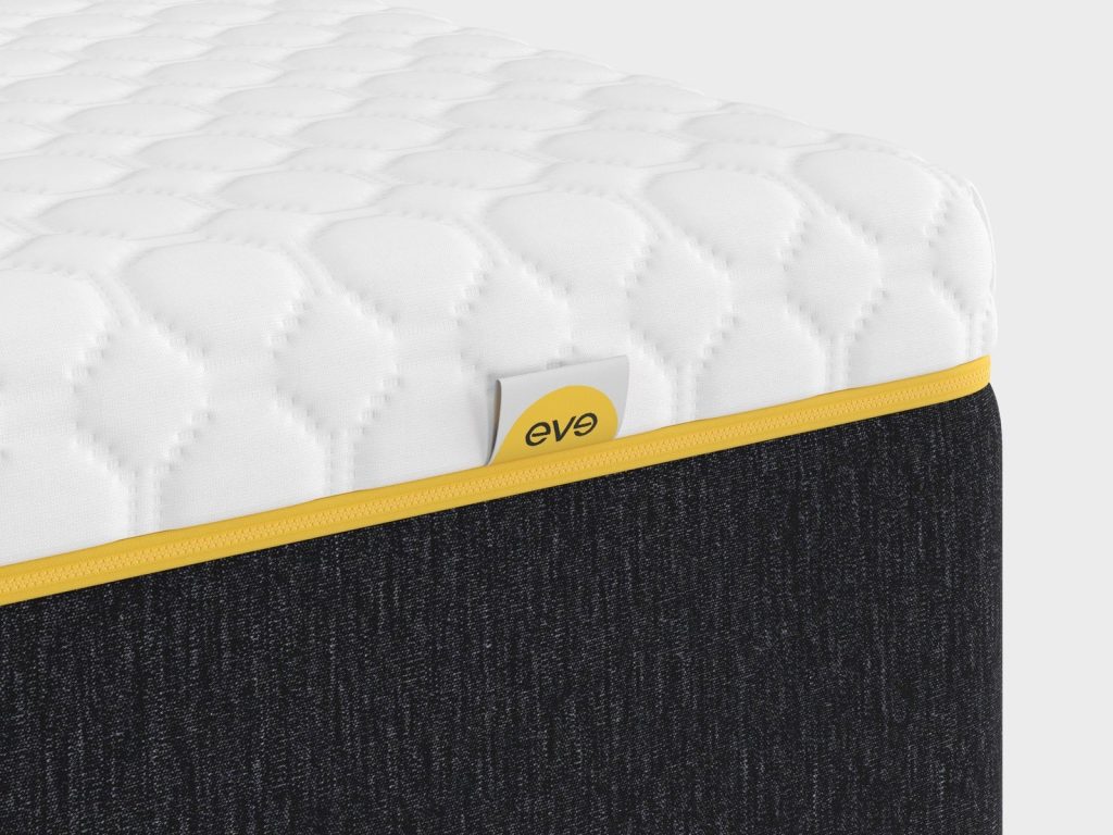 Corner of the Eve Wunderflip Premium Hybrid Mattress with quilted top and eve label