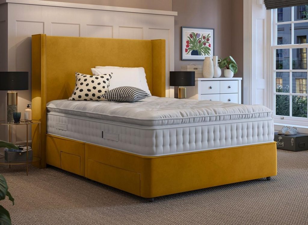 Flaxby Master's Guild 8450 on a mustard velvet divan in a bedroom