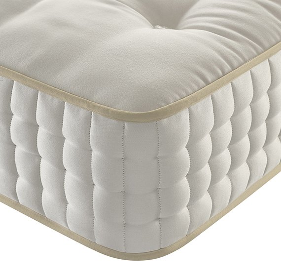 Corner detail of the Harrison Spinks Caspian 13750 with tufting and side stitching