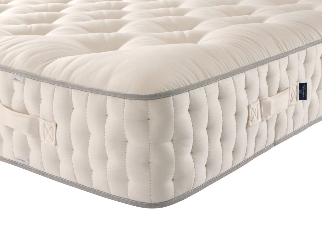Corner of the Harrison Spinks Diamond 25000 with diamond side stitching and handles