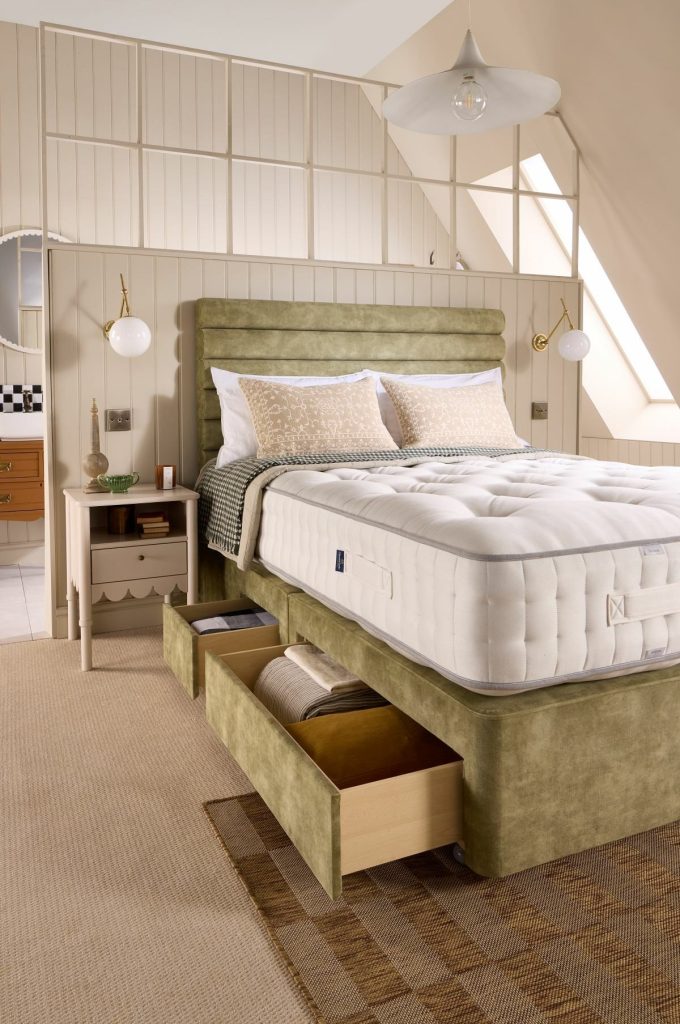 Harrison Spinks Jade 10000 mattress on a green storage divan with an open drawer