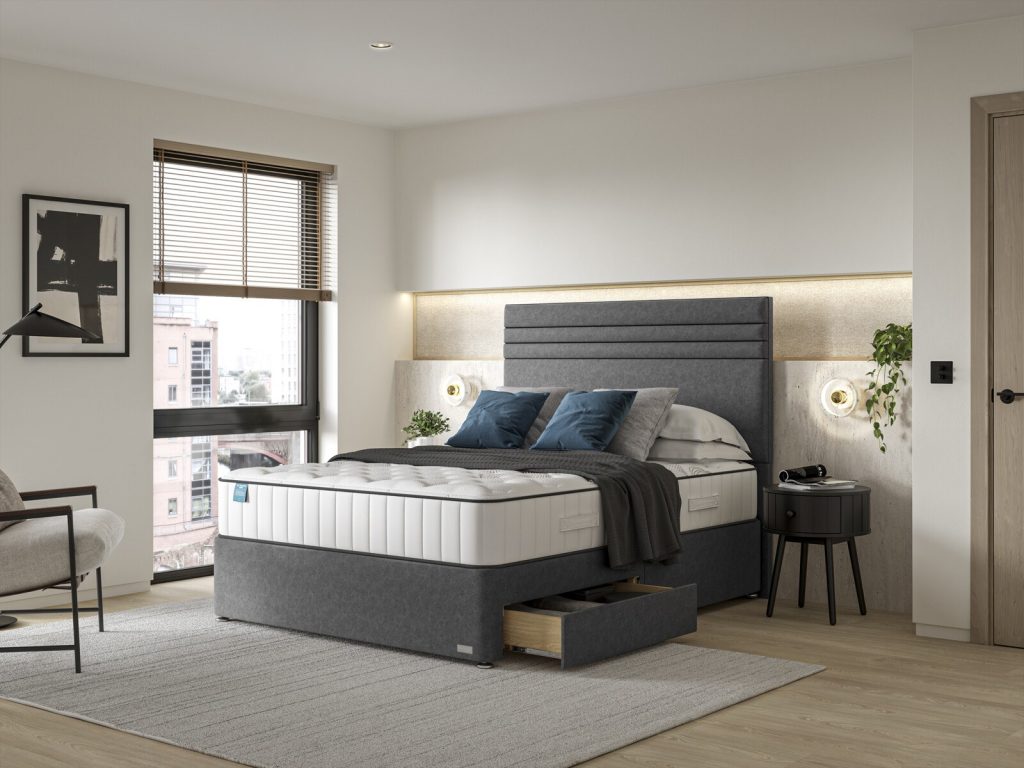 iGel NanoTech 2050i on a grey divan in a modern bedroom