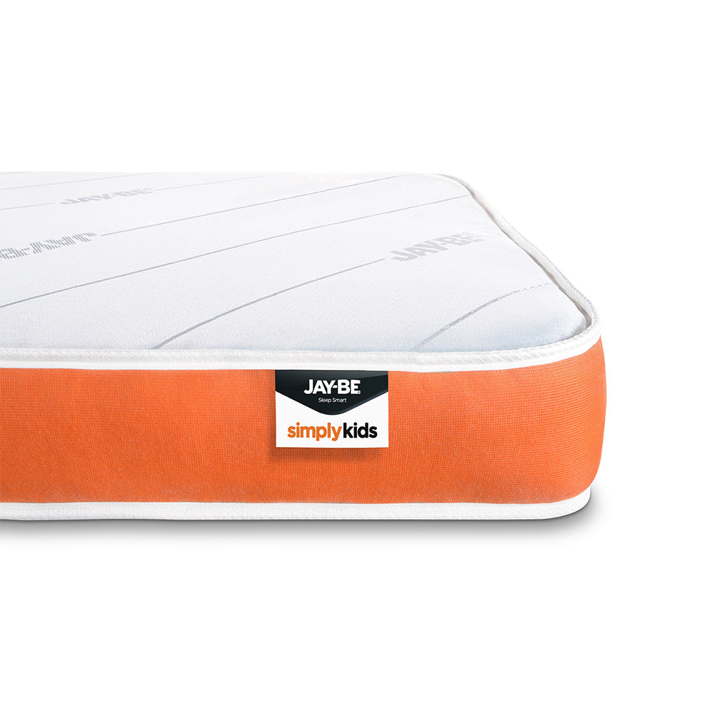 Orange border and Simply Kids label on the Jay-Be mattress