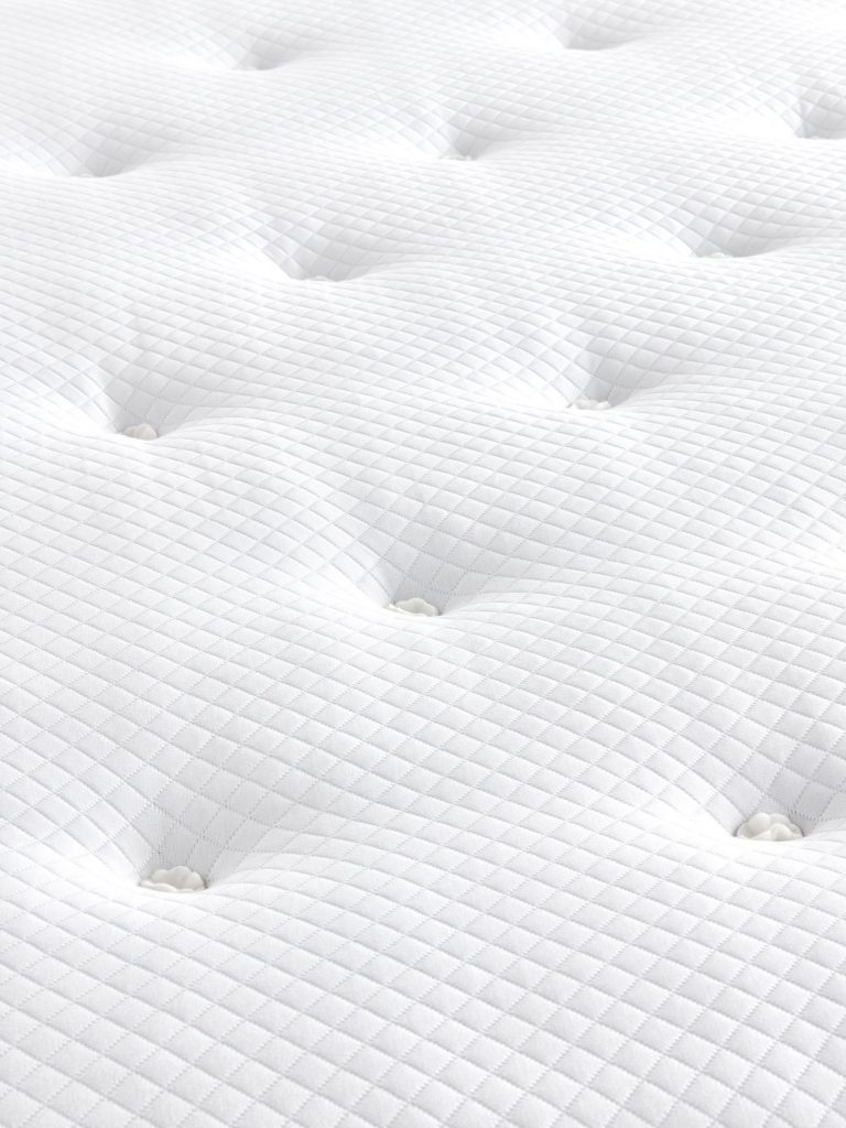 John Lewis Ortho Pocket Collection 1400 Mattress close-up of the hand-tufted top