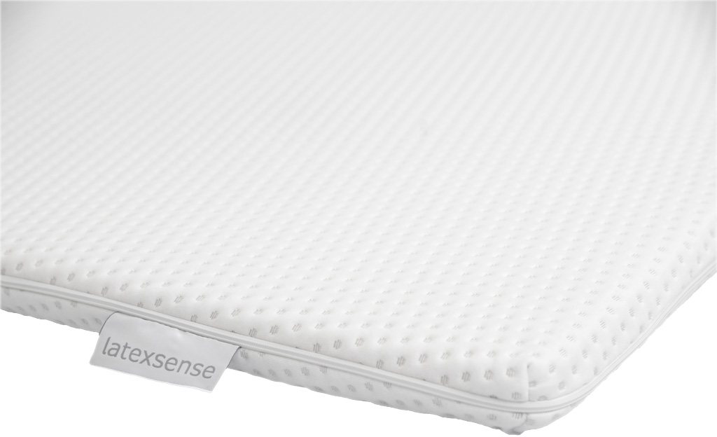 Close-up of the Latex Sense Firmsense topper cover with its knitted Tencel and cotton surface and label