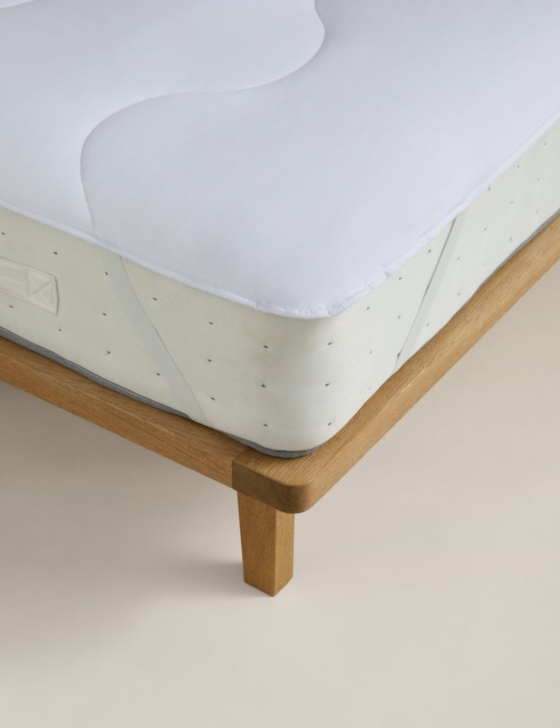 M&S Everyday Mattress Enhancer with wave quilting fitted on a mattress