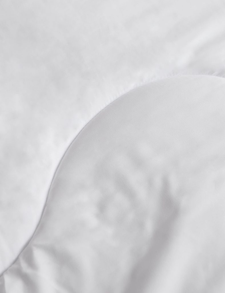 Close-up of the M&S Everyday Mattress Enhancer wave quilting