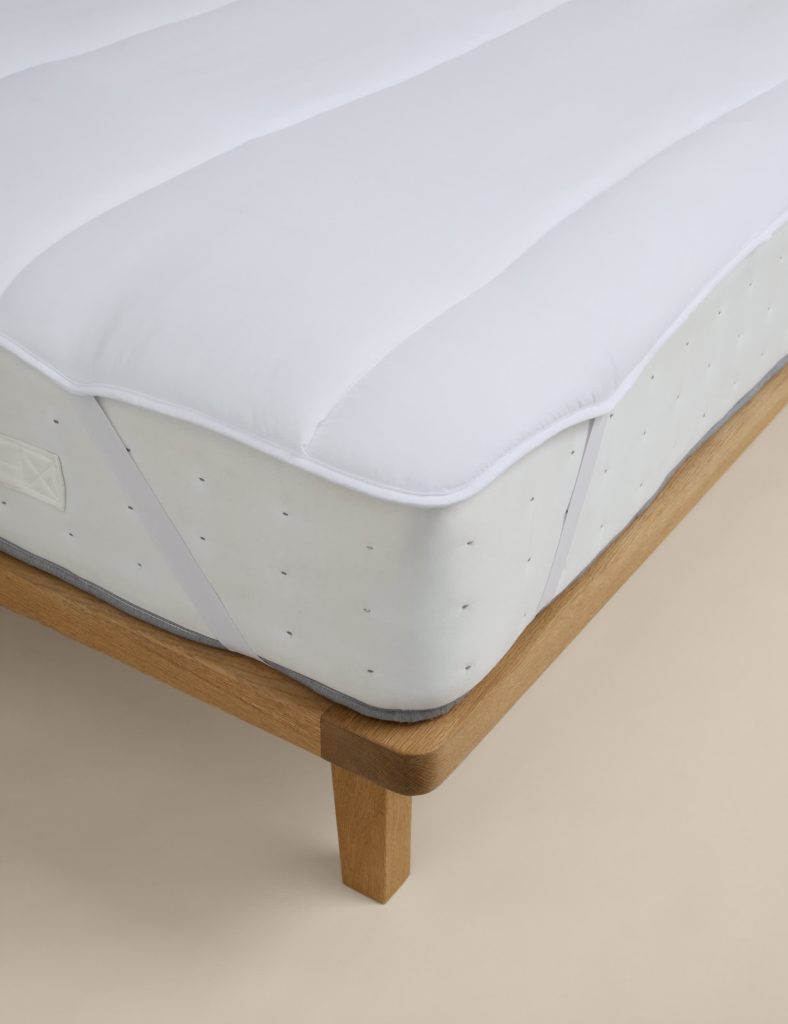 M&S Smart Wash and Dry Anti Allergy Mattress Topper fitted on a mattress