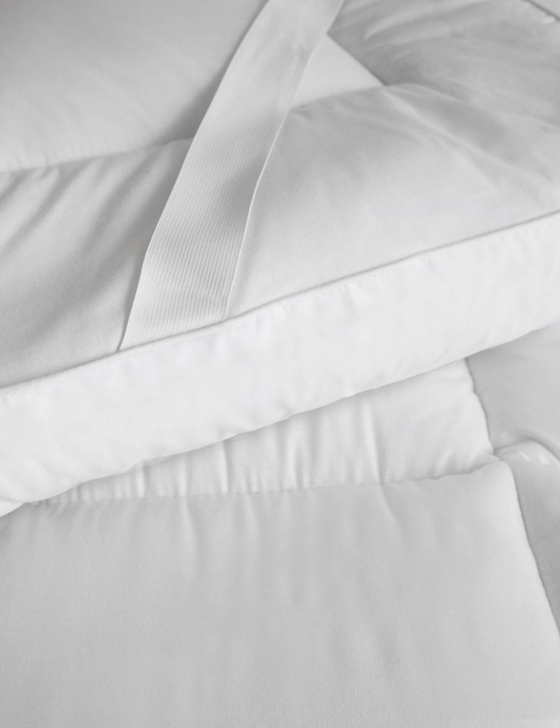 Elastic corner strap on the M&S Stay Cool 10cm Depth Mattress Topper