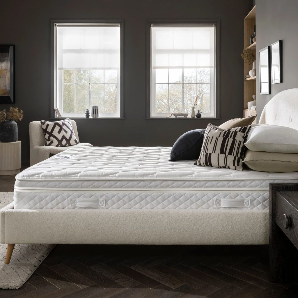 Premier Inn Mattress 2.0 on a boucle bed frame, seen from the side
