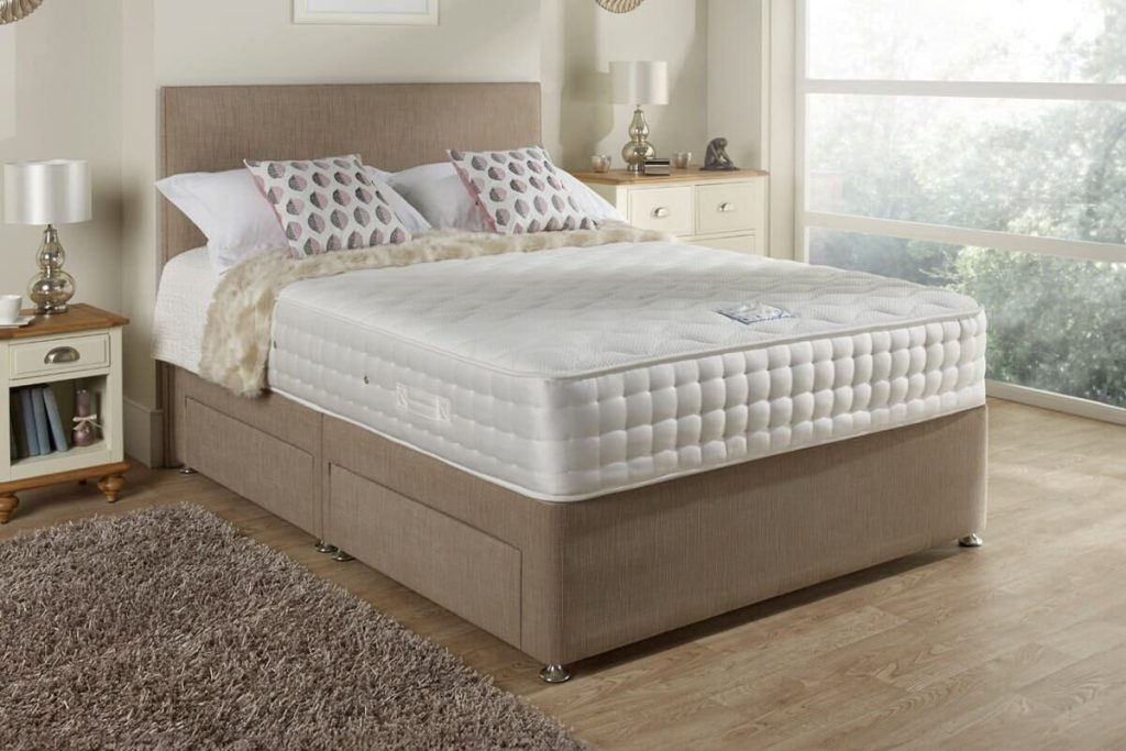 Relyon Chelsea 1500 Memory mattress on a beige divan in a bright bedroom