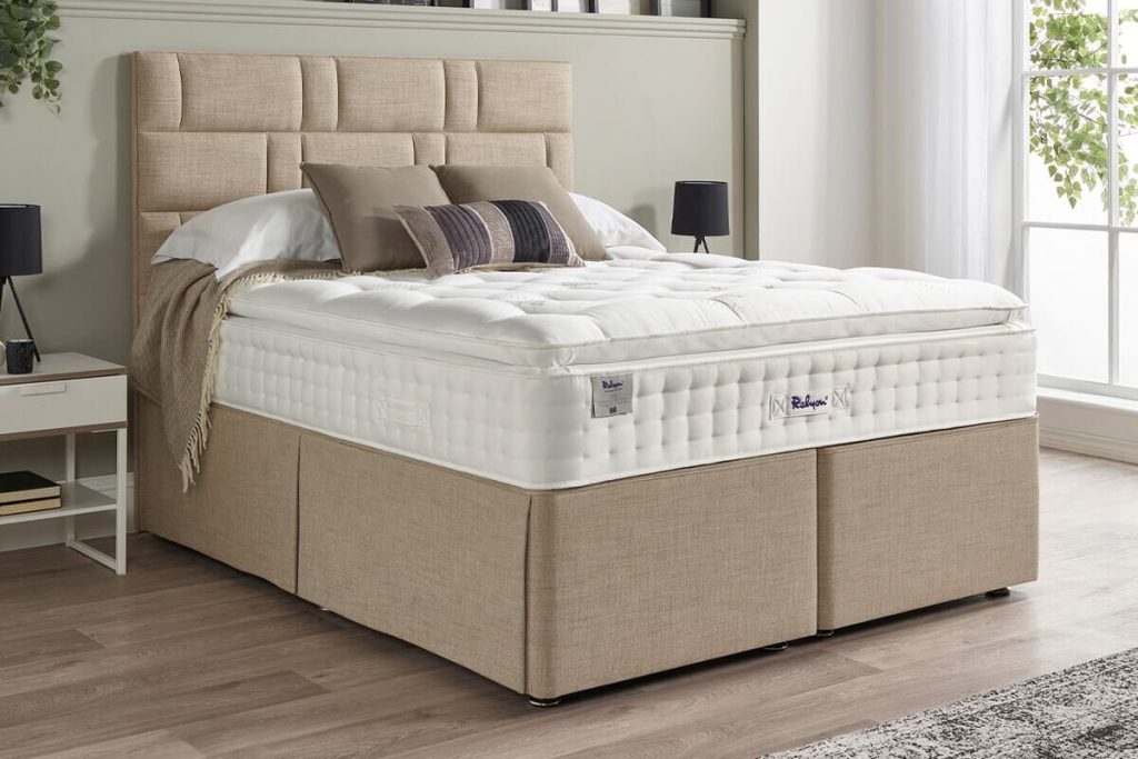 Relyon Natural Luxury Supreme 2150 Pillow Top on a beige divan in a bright bedroom