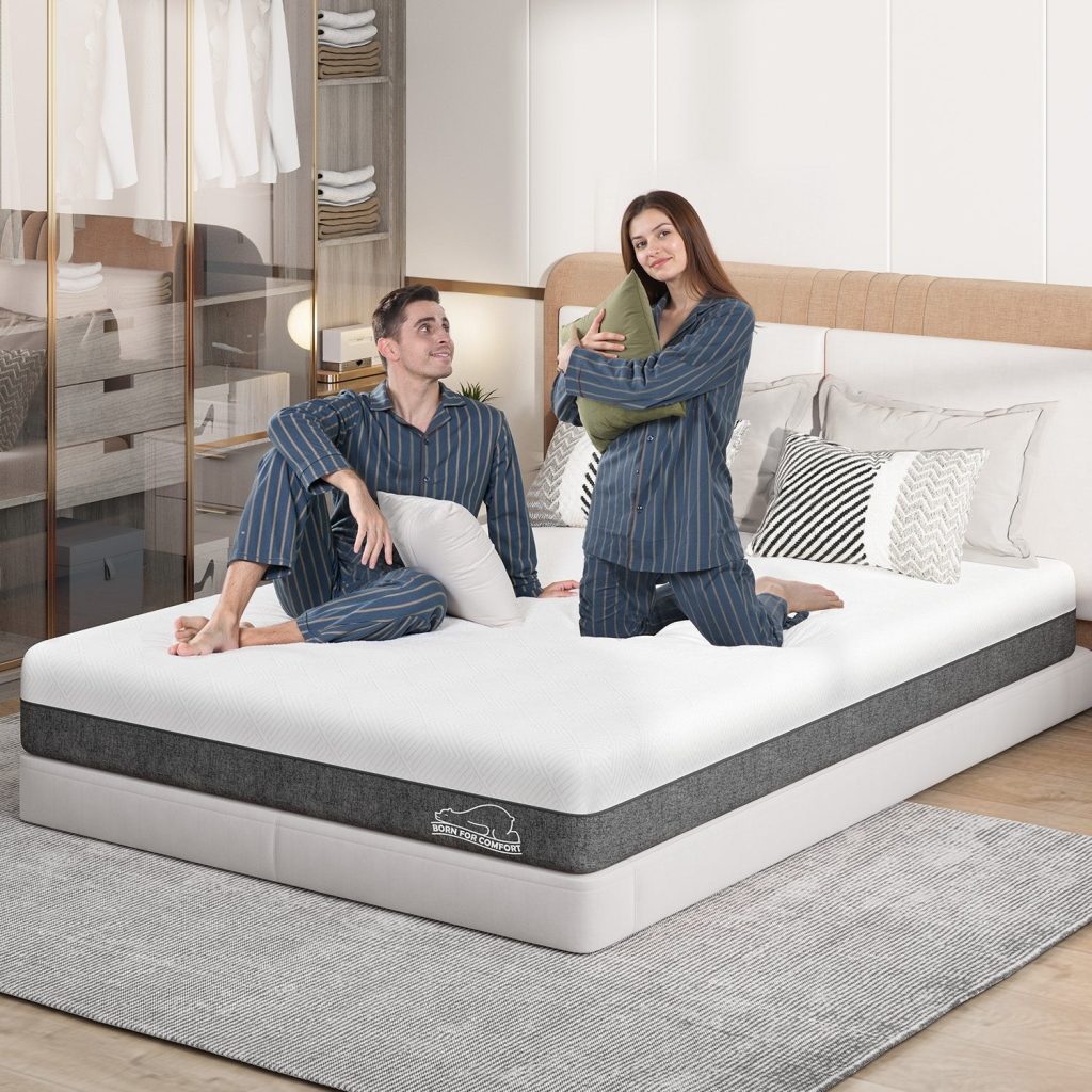 Couple sitting on the RattanTree memory foam mattress