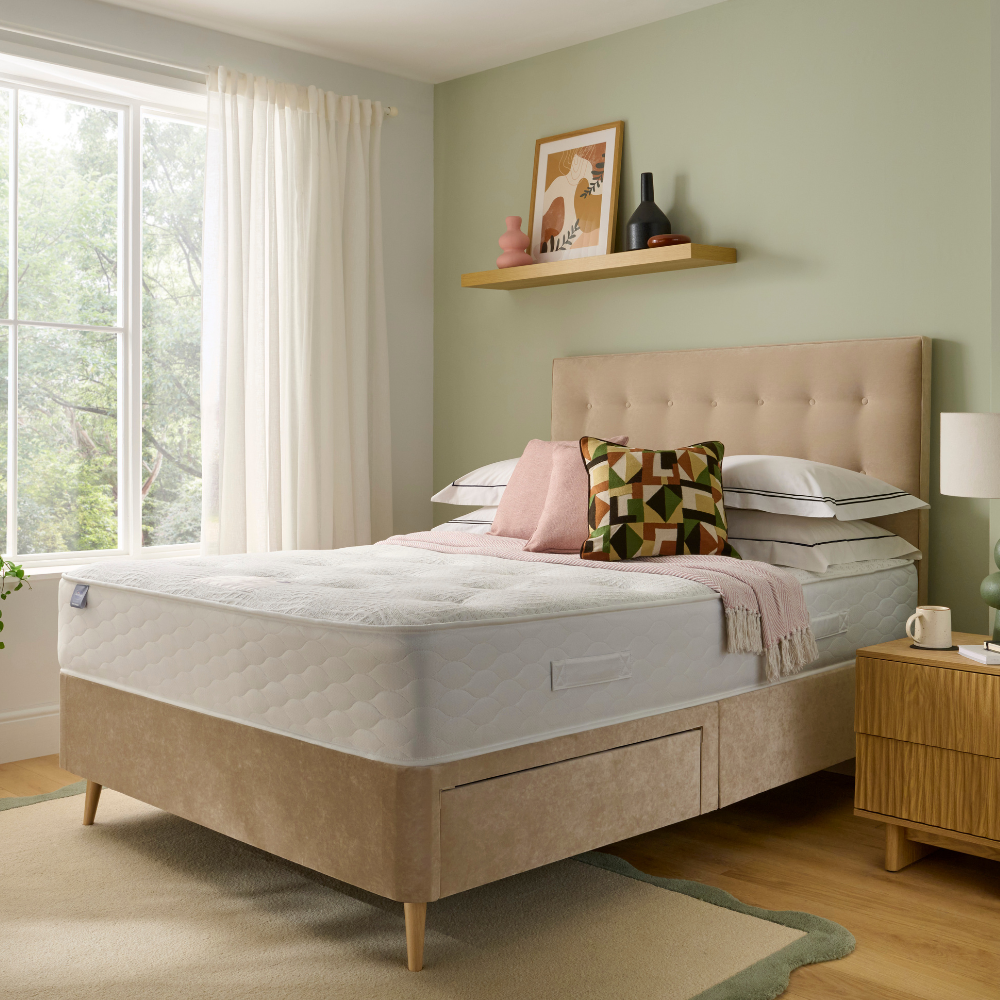 Silentnight Comfort Breathe 1400 Pocket Ortho mattress, on a divan bed with drawers in a green bedroom
