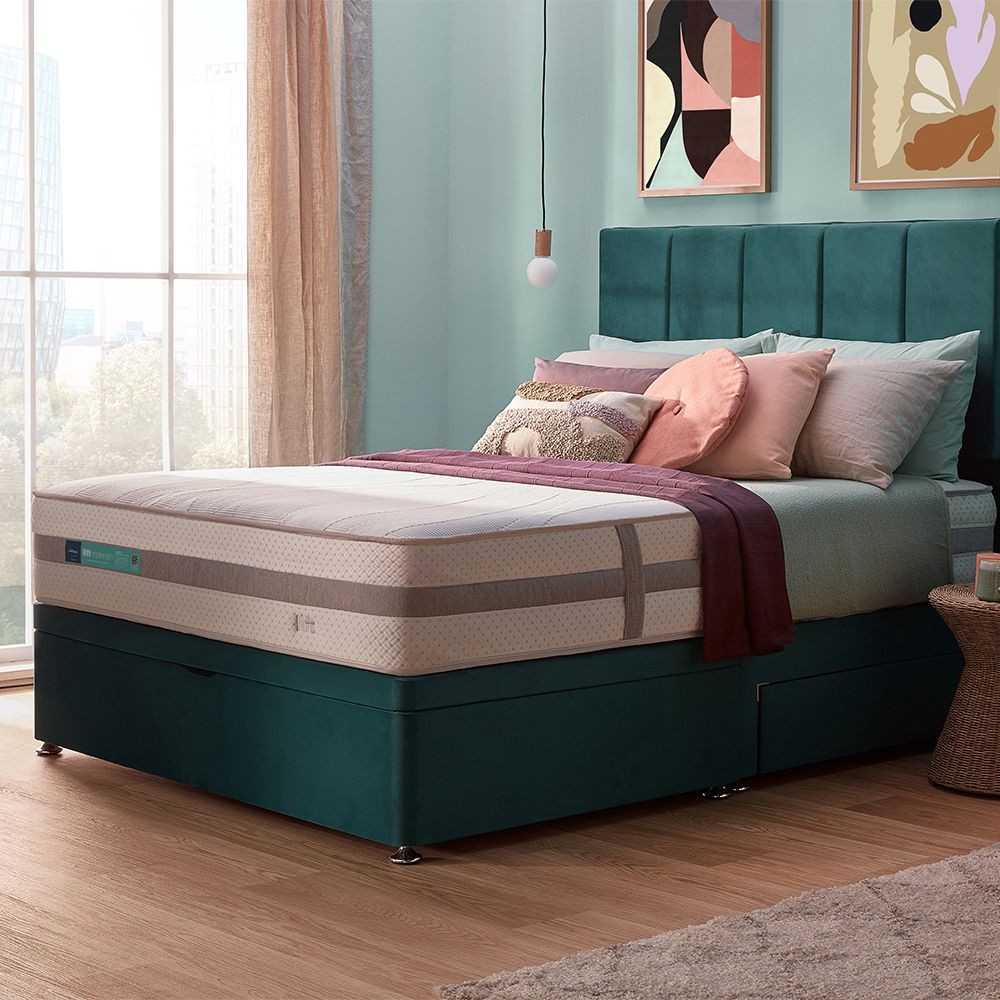 Silentnight Lift Replenish Hybrid 2000 mattress on a green ottoman bed, angled view