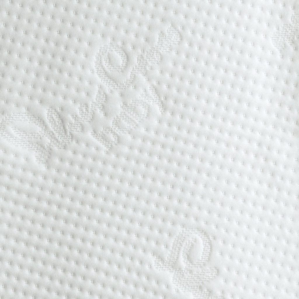 Silver Cross TrueFit Dual-Sided Pocket Spring Cot Bed Mattress close-up of the knitted cover