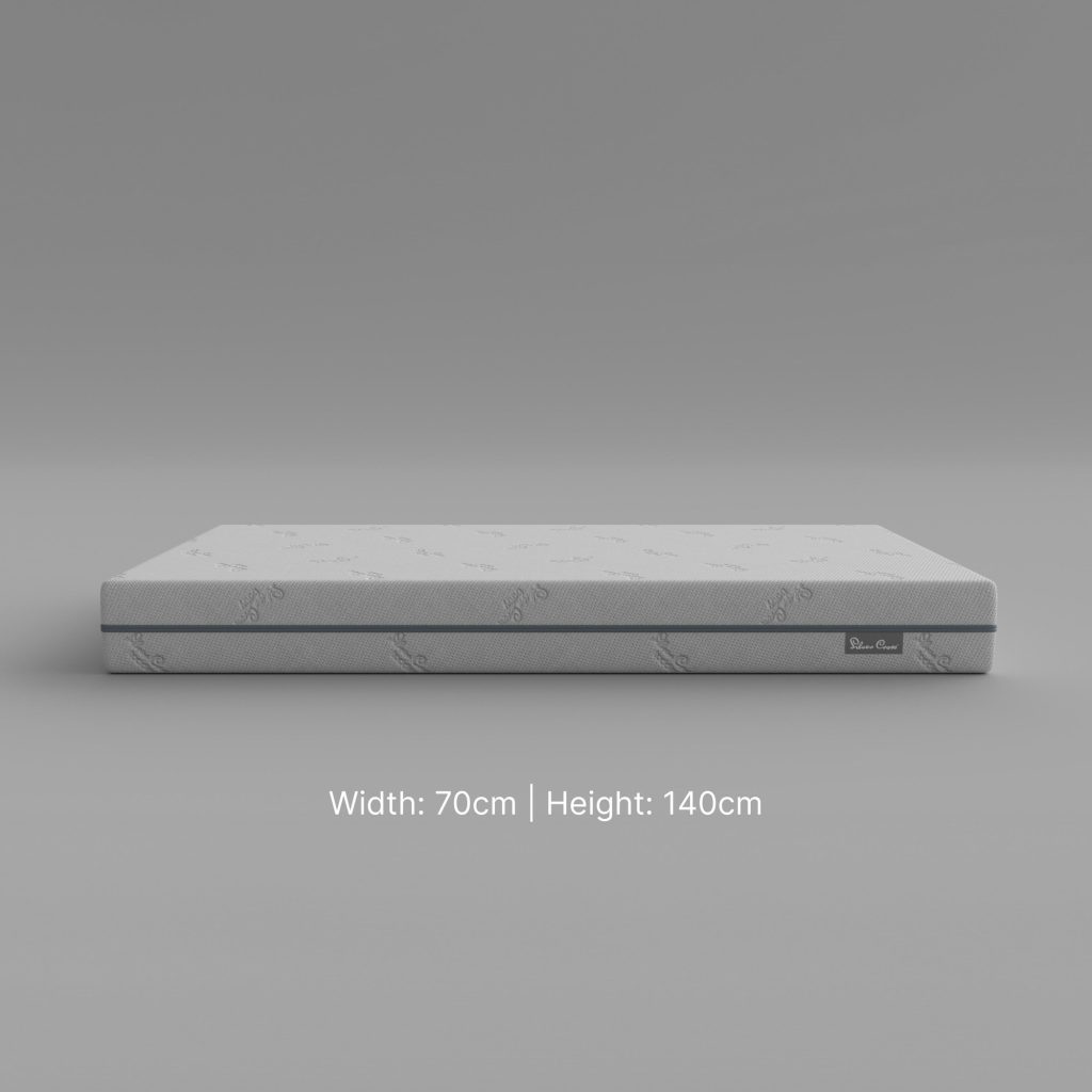 Silver Cross TrueFit Reversible Pocket Spring Cot Bed Mattress side view with 70 x 140cm size label