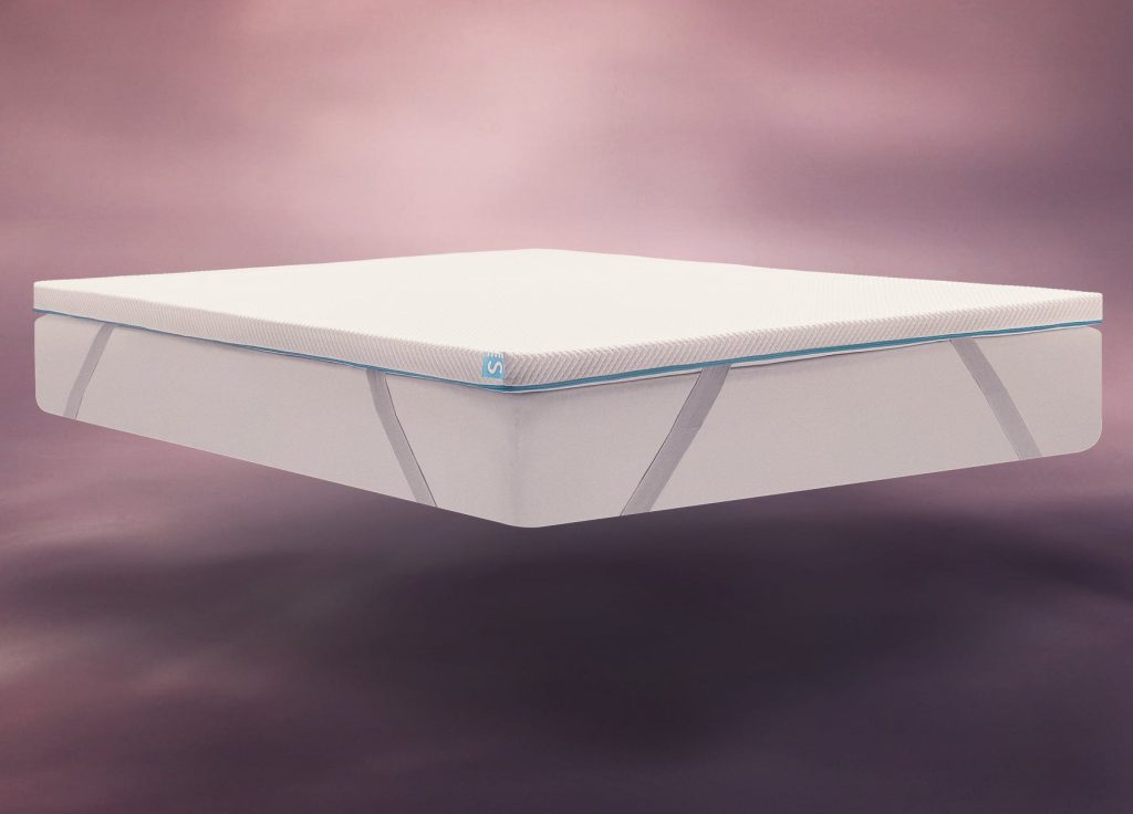 Simba Hybrid Essential Mattress Topper fitted on a mattress with its corner straps