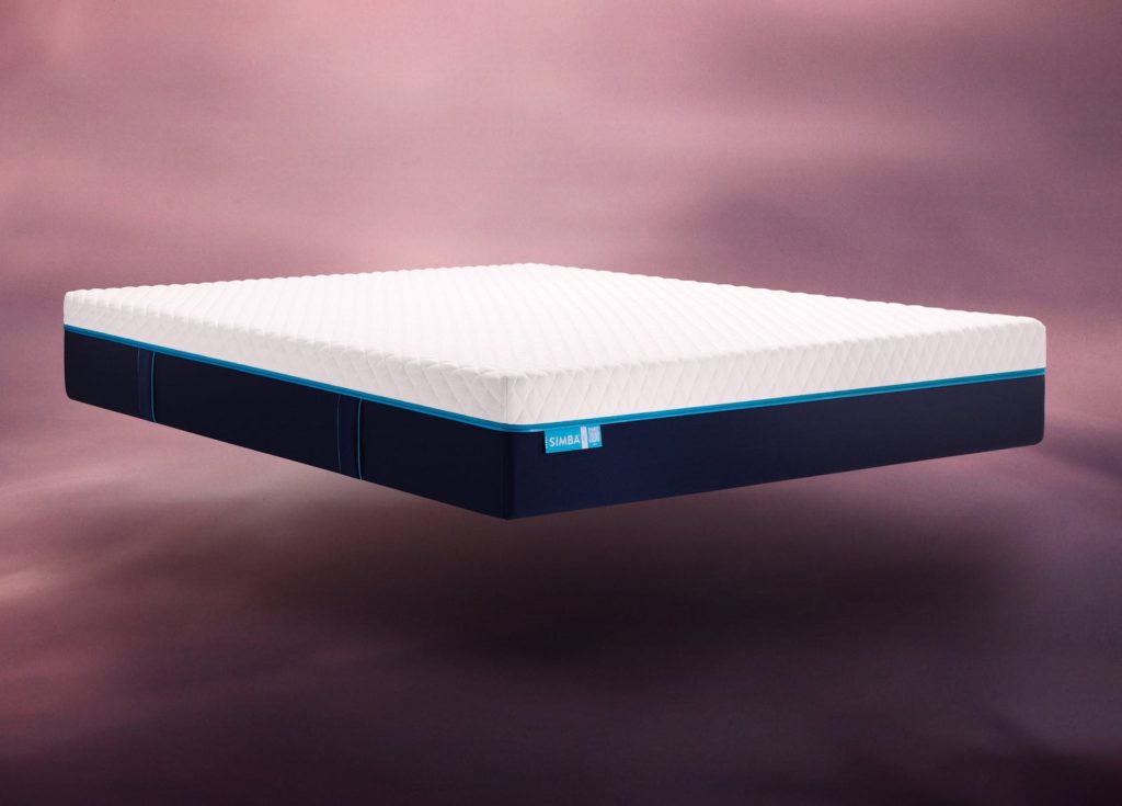 Simba Hybrid Pro Mattress with navy base and quilted top, studio shot