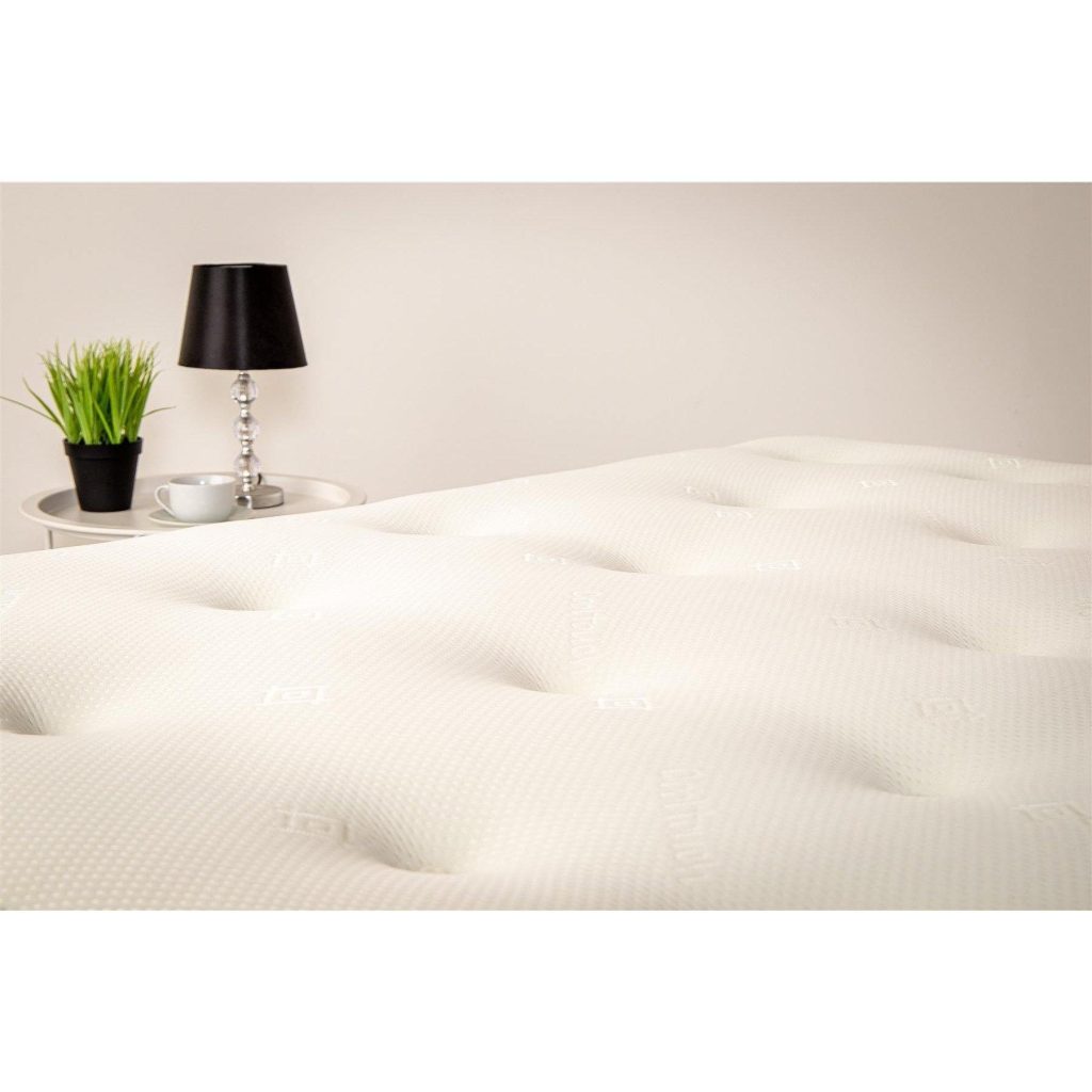 Close view of the hand tufted sleeping surface of the Starlight Beds Virgo
