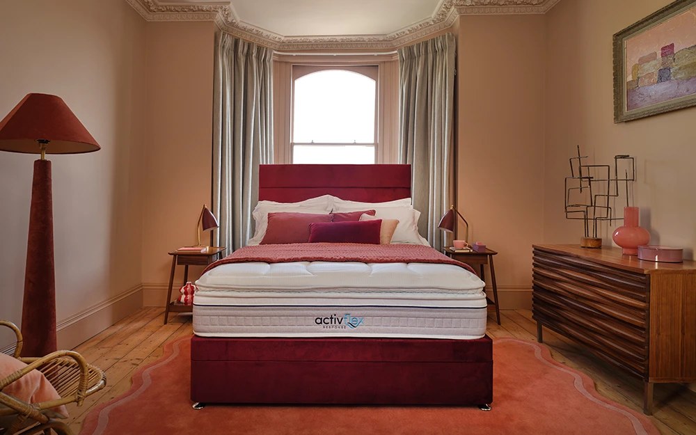 Sleepeezee ActivFlex Response 3600 mattress on a red divan in a period bedroom