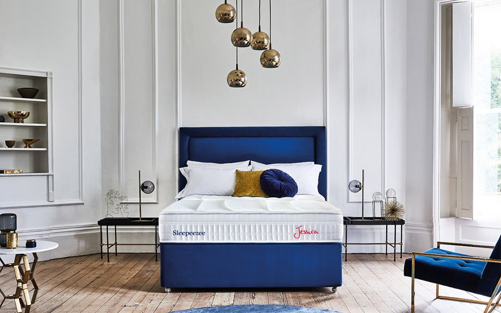 Sleepeezee Jessica 1800 mattress on a navy divan in a bright bedroom