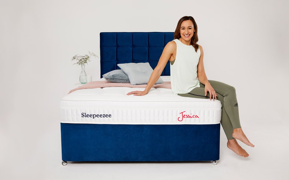 Dame Jessica Ennis-Hill sitting on the Sleepeezee Jessica 1800 mattress