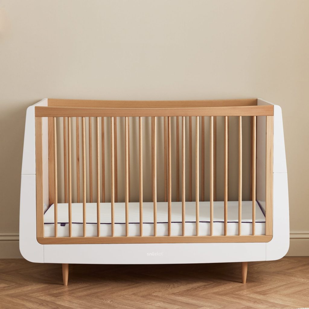 Snüz SnuzSurface Duo Cot Bed Mattress in a white and oak SnuzKot cot bed