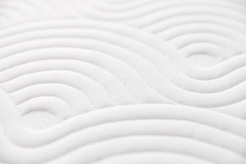 Close-up of the quilted cover pattern on the TEMPUR ONE Topper