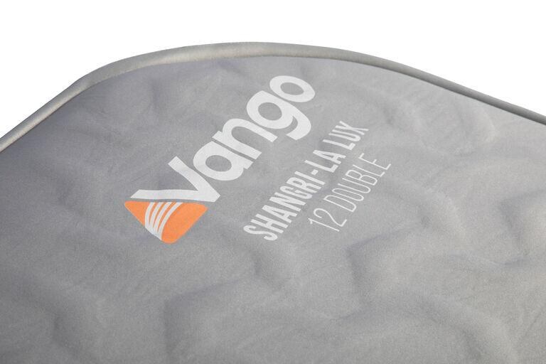 Close-up of the knitted top fabric and Vango logo on the Shangri-La Lux 12 Double