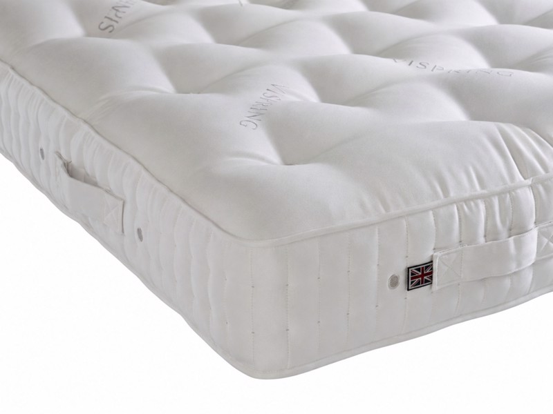 Close-up of the Vispring Bedstead Traditional corner, handle and tufting