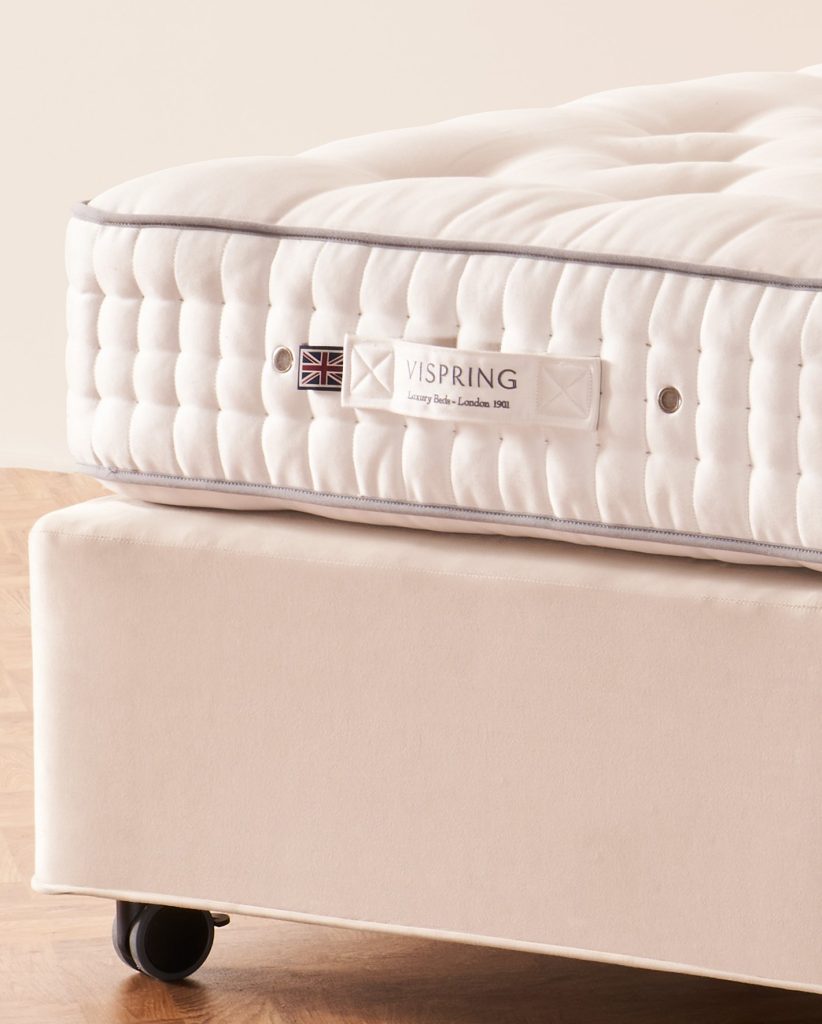 Close-up of the Vispring Regal Superb border with label and triple side-stitching