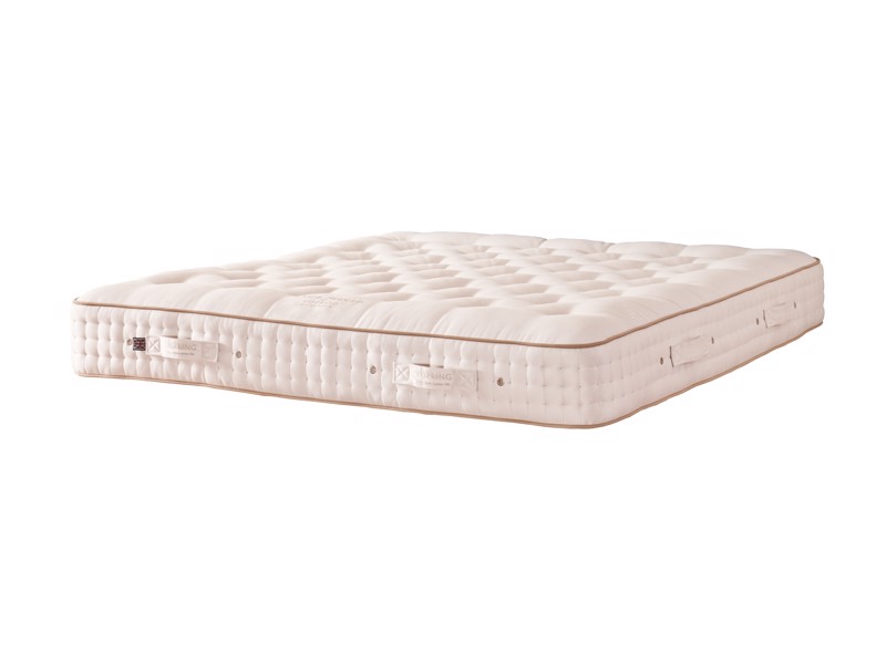 Vispring Tiara Superb mattress on a white background with gold piping