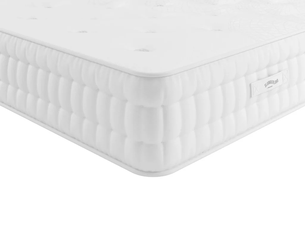 Corner of the Slumberland Naturals Plant-Based Luxe showing the tufted side panel