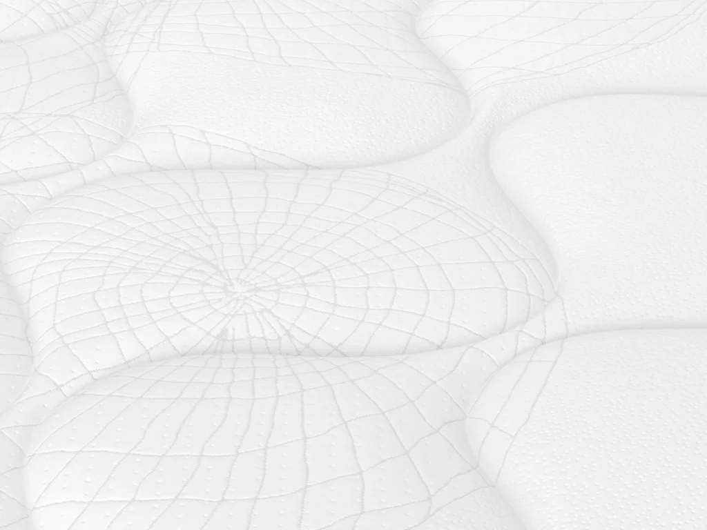 Close-up of the quilted TENCEL cover of the Slumberland Naturals Premium Wool