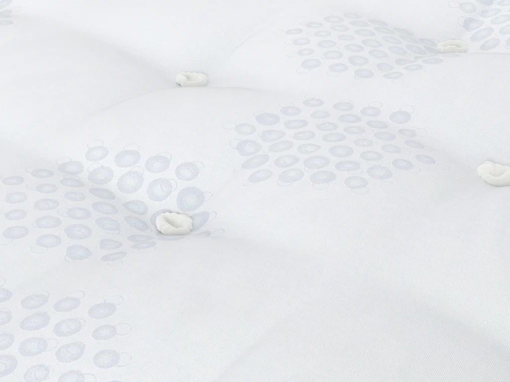 Close-up of the hand-tufted damask surface of the Highbury Ortho Comfort